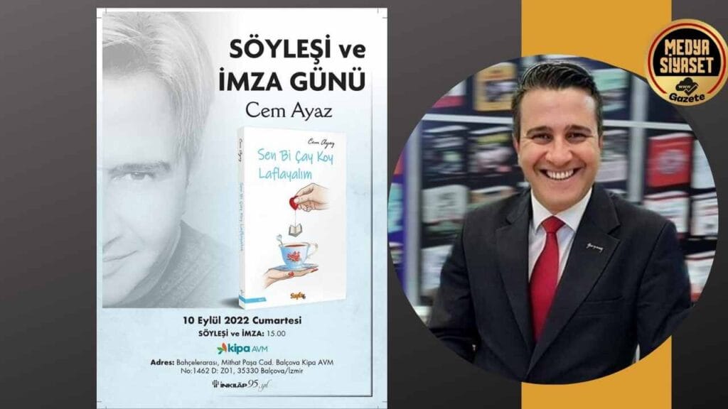 Cem Ayaz kitaplarını imzalıyor